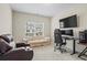 This bedroom features a large window, plush carpeting, and comfortable seating, perfect for a relaxing space at 359 Crider Ct, Woodstock, GA 30188