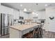 Eat in kitchen with modern stainless appliances, granite countertops, and island seating at 359 Crider Ct, Woodstock, GA 30188