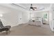 Spacious main bedroom featuring a decorative ceiling, two windows with blinds, and plush carpeting at 3987 Tamarack Nw Dr, Kennesaw, GA 30152