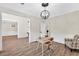 Spacious home office with modern desk, chair, and views into other rooms at 3987 Tamarack Nw Dr, Kennesaw, GA 30152