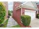 Brick exterior with a single-car garage and neatly landscaped walkway providing curb appeal at 1489 Belmont Hills Dr, Suwanee, GA 30024