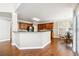 Eat-in kitchen area featuring wood cabinets, granite countertops, and stainless steel appliances at 1489 Belmont Hills Dr, Suwanee, GA 30024