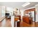 Open concept kitchen and eat-in area featuring wood cabinets, and stainless steel appliances at 1489 Belmont Hills Dr, Suwanee, GA 30024