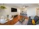Inviting living room with hardwood floors, modern furnishings, and an open layout connecting to the kitchen at 300 Peachtree Ne St # 14H, Atlanta, GA 30308