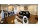 Open concept living area features hardwood floors, modern furniture, and an inviting atmosphere at 300 Peachtree Ne St # 14H, Atlanta, GA 30308