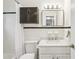 Classic bathroom featuring white tile, a vanity with marble countertop, and a shower/tub combination at 311 Peachtree Hills Ne Ave # 13B, Atlanta, GA 30305