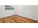 Bedroom featuring hardwood floors, a chandelier, and natural light at 311 Peachtree Hills Ne Ave # 13B, Atlanta, GA 30305