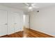 Cozy bedroom with hardwood floors, and two white closets at 311 Peachtree Hills Ne Ave # 13B, Atlanta, GA 30305