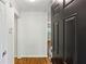 Welcoming entryway with hardwood floors and a stylish front door at 311 Peachtree Hills Ne Ave # 13B, Atlanta, GA 30305