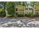 Inviting two-story apartment building with well-maintained landscaping and ample parking at 311 Peachtree Hills Ne Ave # 13B, Atlanta, GA 30305