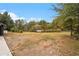 Large backyard ready for you to make it your own with mature trees and a classic fence at 6219 Heardsville Rd, Cumming, GA 30028