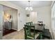 Dining area with tiled flooring next to a living area with hardwood floors at 6561 Squire Pl, Douglasville, GA 30135