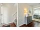 Entryway boasts stylish decor, wood floors, and staircase leading to the upper level at 6561 Squire Pl, Douglasville, GA 30135