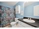 Cozy bathroom featuring a fish-themed shower curtain and modern fixtures against a light blue backdrop at 3030 Winchester Dr, Cumming, GA 30041