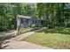 Beautiful exterior of home with a front porch and driveway leading to the house at 3030 Winchester Dr, Cumming, GA 30041