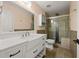 Bathroom featuring a glass shower and a white sink vanity at 5156 Amberden Hall Dr, Suwanee, GA 30024