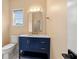 Updated half bath with a new vanity and fixtures at 5156 Amberden Hall Dr, Suwanee, GA 30024