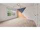 Bedroom featuring a large window at 5156 Amberden Hall Dr, Suwanee, GA 30024
