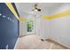 Bright bedroom with large window and closet at 5156 Amberden Hall Dr, Suwanee, GA 30024