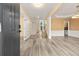 Inviting open-concept living area with wood floors and natural light at 5156 Amberden Hall Dr, Suwanee, GA 30024