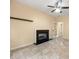 Bright and airy living room featuring a decorative ceiling fan, fireplace, and marble flooring at 5156 Amberden Hall Dr, Suwanee, GA 30024
