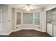 Cozy breakfast nook with natural light and hardwood floors, with laundry closet at 6092 Giles Ct, Lithonia, GA 30058