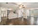 Open-concept living space featuring hardwood floors, modern appliances, and lots of natural light at 6092 Giles Ct, Lithonia, GA 30058