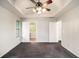 Large main bedroom with a ceiling fan, a walk-in closet and an attached bathroom at 6092 Giles Ct, Lithonia, GA 30058