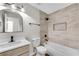 Newly remodeled bathroom with modern fixtures and tiled shower at 8592 Hidden Creek Cir, Snellville, GA 30039