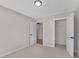 Bedroom featuring neutral decor and closet at 8592 Hidden Creek Cir, Snellville, GA 30039