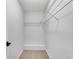 Walk-in closet with shelving and plush carpeting at 8592 Hidden Creek Cir, Snellville, GA 30039