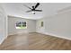 Large living room with modern ceiling fan at 8592 Hidden Creek Cir, Snellville, GA 30039