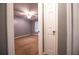 Bedroom with tan carpet, a lit ceiling fan, and a view to the outside at 122 Summer Pl, Norcross, GA 30071