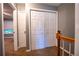 Hallway with carpet flooring and built in closet providing access to multiple rooms, for an efficient home layout at 122 Summer Pl, Norcross, GA 30071