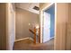 Hallway with carpeted stairs and multiple closed, white doors at 122 Summer Pl, Norcross, GA 30071