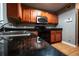 Modern kitchen showcasing granite countertops and stainless steel appliances at 122 Summer Pl, Norcross, GA 30071