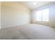 Bright and airy bedroom with a large window providing natural light at 200 Renaissance Ne Pkwy # 310, Atlanta, GA 30308
