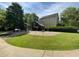 Expansive backyard featuring a swing set, offering a serene outdoor experience at 2092 Wood Nw Trl, Atlanta, GA 30318