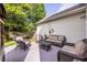 Cozy backyard with patio furniture, offering a relaxing outdoor space and serene ambiance at 2092 Wood Nw Trl, Atlanta, GA 30318