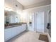 Spacious bathroom featuring white cabinetry and granite countertops at 2092 Wood Nw Trl, Atlanta, GA 30318