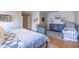Comfortable bedroom featuring an area with a chair and crib for a baby at 2092 Wood Nw Trl, Atlanta, GA 30318