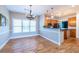 Dining area with wood floors gets plenty of natural light from large windows at 2092 Wood Nw Trl, Atlanta, GA 30318