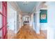 Elegant entryway with hardwood floors, blue ceiling, and archways providing a grand entrance at 2092 Wood Nw Trl, Atlanta, GA 30318