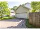 Detached two-car garage with ample parking space and a well-kept driveway at 2092 Wood Nw Trl, Atlanta, GA 30318