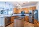 Modern kitchen with stainless steel appliances, a center island, and a convenient dishwasher for easy cleanup at 2092 Wood Nw Trl, Atlanta, GA 30318