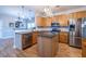Modern kitchen with stainless steel appliances, wood cabinets, and island perfect for cooking and entertaining at 2092 Wood Nw Trl, Atlanta, GA 30318