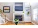 Close-up view of the living room's fireplace and built-in shelving at 2092 Wood Nw Trl, Atlanta, GA 30318