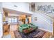 Open concept living room with hardwood floors, staircase, and view to kitchen at 2092 Wood Nw Trl, Atlanta, GA 30318