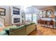 Elegant living room showcasing fireplace, hardwood floors, and decorative mirrors at 2092 Wood Nw Trl, Atlanta, GA 30318