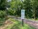 A scenic path surrounded by nature, perfect for a leisurely walk or bike ride at 2092 Wood Nw Trl, Atlanta, GA 30318